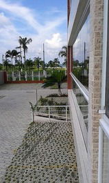 Apartment in Bertioga, Indaiá standing on the sand, overlooking the sea