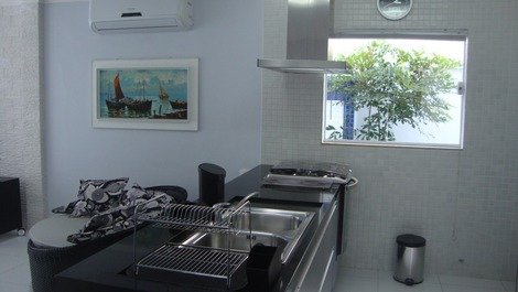 Cozinha integrada com as salas