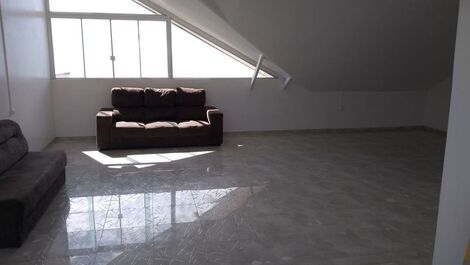 TRIPLEX IN FRONT OF THE SEA
