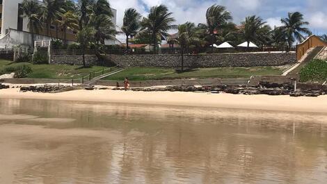 Praia vista para a casa terreno