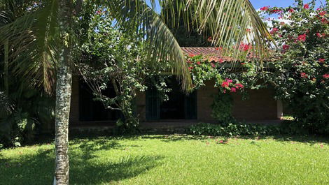 Large house in front of the beach