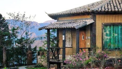 Chalet in octagonal structure, with fireplace, living room, kitchen and decoration...