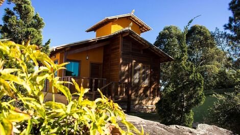 Wooden chalet with a suite, bedroom, bathroom, living room and kitchen (s...