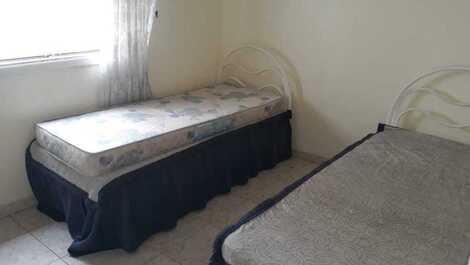 Quarto com camas de solteiro 