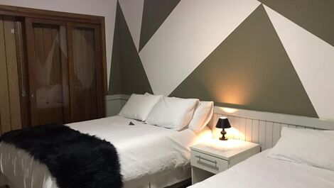Quarto Triplo com Vista Jardim