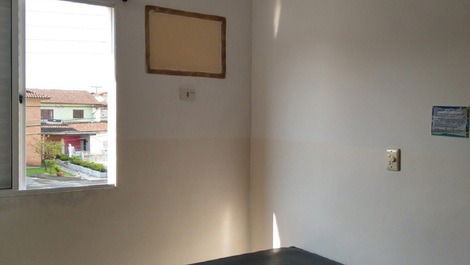 Quarto casal com ventilador teto