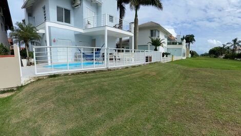 Seaside beach house with pool, air conditioning, TVs and WI FI