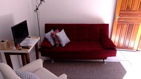 Sala com sofá cama de casal
