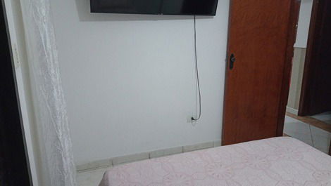 Apartamento com área de lazer e vista mar.