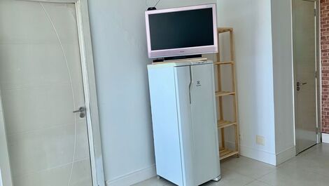 Área de churrasco com tv