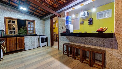 Yellow house in Porto das Dunas by Carpediem