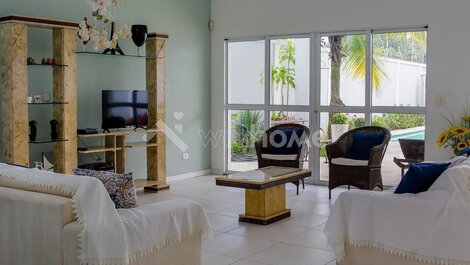 Casa con piscina en la playa de Pernambuco en Guarujá