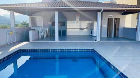 Apartamento com churrasqueira privativa, com piscina, Itaguá- ubatuba