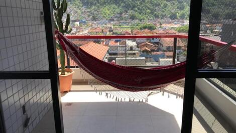 Amplio apartamento, en la caleta, guaruja, con una vista privilegiada a la piscina