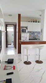 Cozinha integrada com a sala