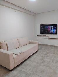 Sala de estar com tv tela plana