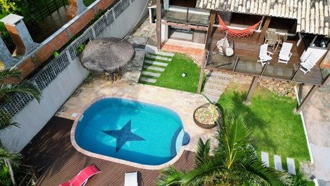 Casa con piscina vista al mar en Ponta das Canas