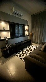 Sala de tv com sofá cama