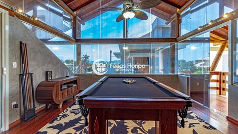 Tropical Luxury: Gated Community with Pool Table, Heated Pool