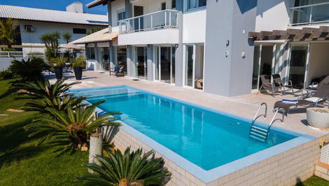 House with pool on the sand