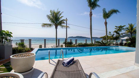 House with pool on the sand