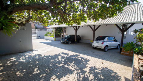 Casa com piscina pé na areia