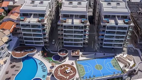 204 Apartment in building with side view of the beach and pool