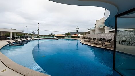 204 Apartment in building with side view of the beach and pool