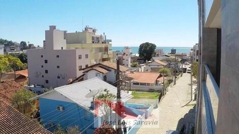 Center of Bombinhas, large, new property with lateral sea views!