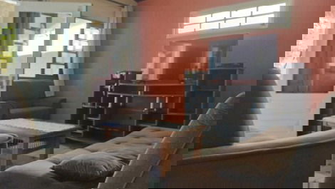 "ambiente de tv com 3 sofas" 