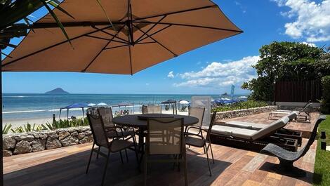 HOUSE IN A CONDOMINIUM ON JUQUEHY BEACH # FEET IN THE SAND