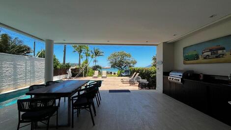 HOUSE IN A CONDOMINIUM ON JUQUEHY BEACH # FEET IN THE SAND