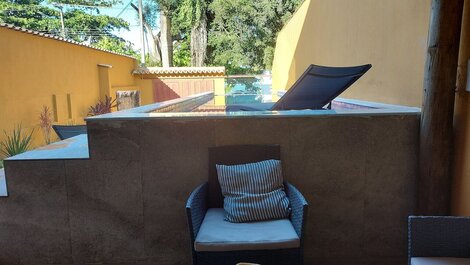 4 suites, infinity pool, beachfront, sleeps 14