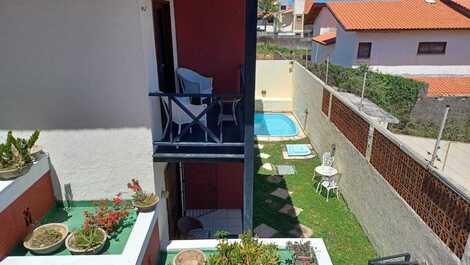 Duplex com jardim e piscina e churrasqueira