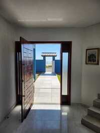 Feet in the sand, seaside refuge in Cabo Frio