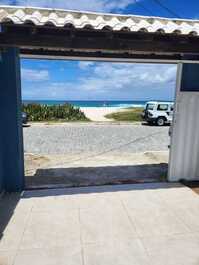 Feet in the sand, seaside refuge in Cabo Frio