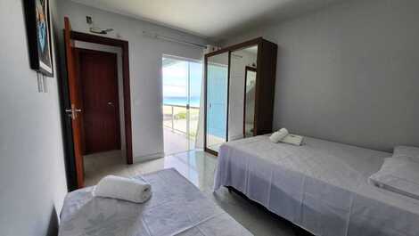 Feet in the sand, seaside refuge in Cabo Frio