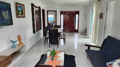 Feet in the sand, seaside refuge in Cabo Frio