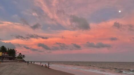 Each of the moon's feet in the sand