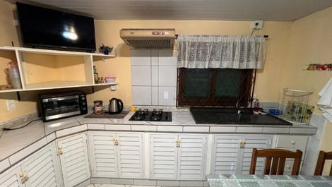 Great house in Enseada, 2 bedrooms with AC, WI-FI, barbecue