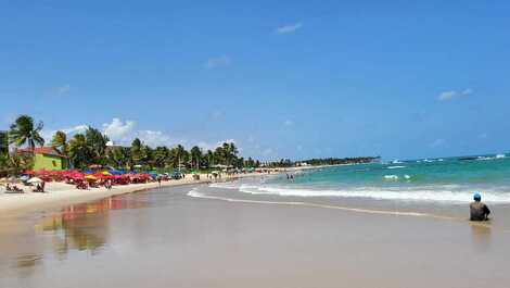 Praia na área da frente da casa