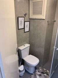 1 Dormitorio Vista Lateral com Pé na Areia