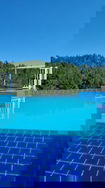 Piscina privativa borda infinta 