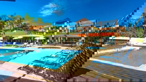 Apartment straight out of a soap opera, resort-style, right on the sand, swimming pools.