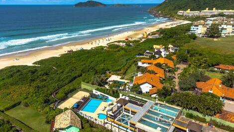 Apartment straight out of a soap opera, resort-style, right on the sand, swimming pools.