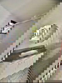 Apart. 2 quartos, área central com uma vaga garagem