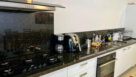 Apartamento com 3 suítes no Condomínio Reserva DNA - Ubatuba - SP