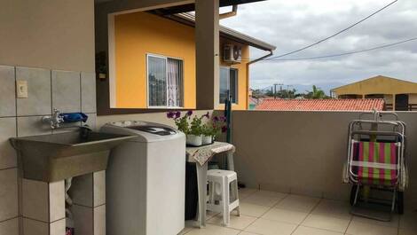 Área compartilhada lavanderia