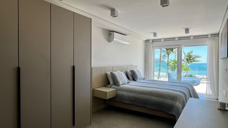6 quartos, piscina, sauna, churrasqueira, frente ao mar.