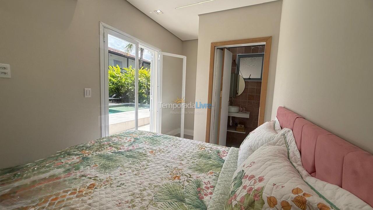 Suite rosa, cama casal Casa para aluguel de temporada em Bertioga (Condominio Morada da Praia)